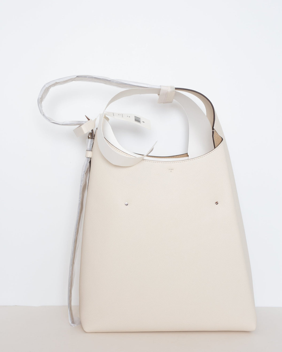 Tory Burch Romy Pebbled Leather Hobo Bag – Light Cream - Wind & Song